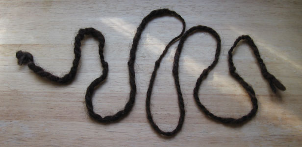 Black yarn, 9 knots spell